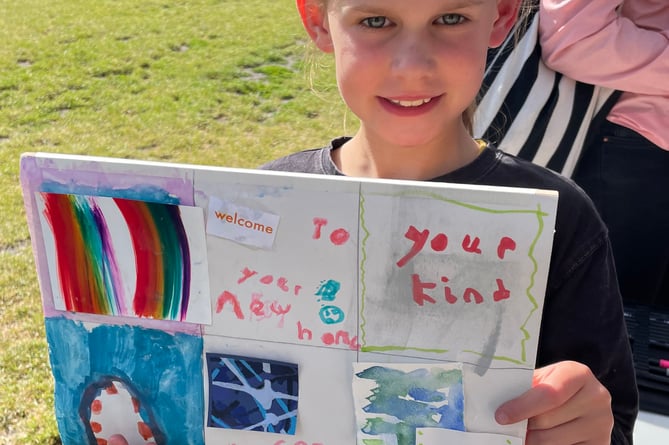 Children create cards to welcome new residents to Brightwells Yard in Farnham, July 2024.