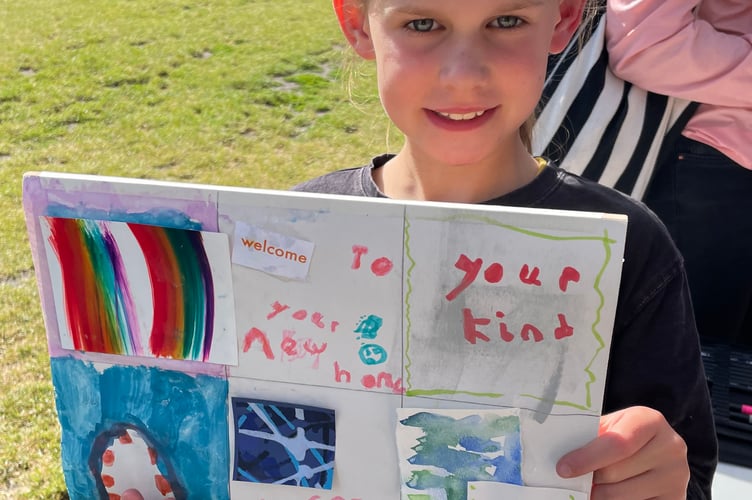 Children create cards to welcome new residents to Brightwells Yard in Farnham, July 2024.