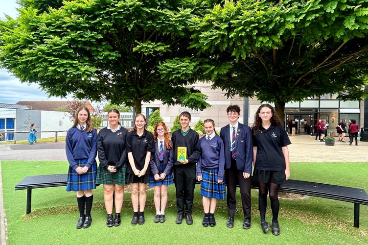 Pupils from schools in the Weydon Multi Academy Trust with a copy of their 2023-24 book award winner, HappyHead by Josh Silver, June 27th 2024.