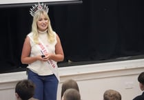 Pupils keen to have picture with Miss England as she visits school