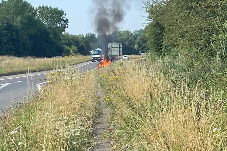 Car fire between Bentley and Dippenhall