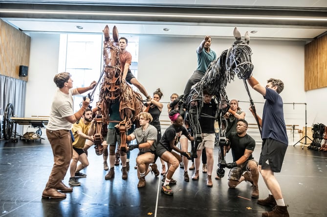 The cast of War Horse in rehearsals.