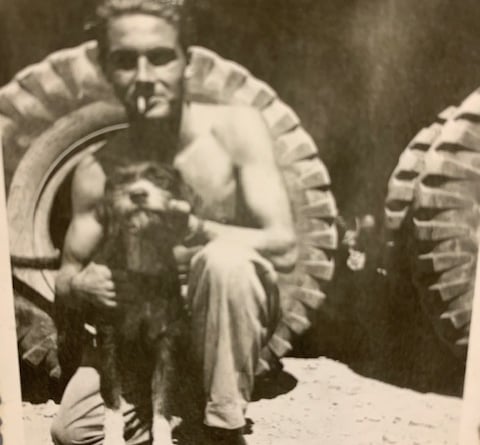 Ed Nelson makes a four-legged friend during the Second World War