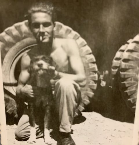 Ed Nelson makes a four-legged friend during the Second World War