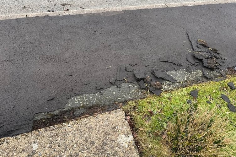 Crumbling pavement White Cottage Close