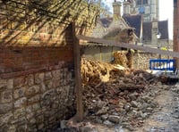 Wall collapse blocks path to St Andrews Church